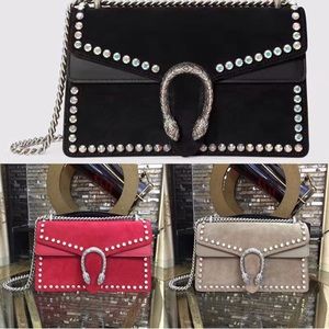 Crystal embellished suede shoulder bag